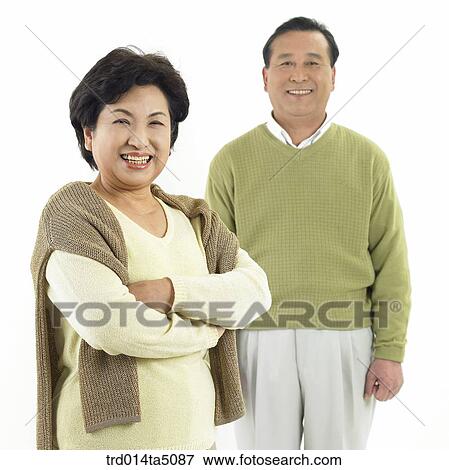 Stock Photo - Family/ an friendly old couple. Fotosearch