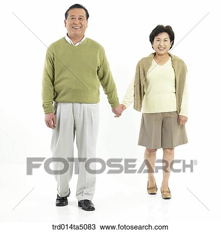 Family/ an friendly old couple taking by the hand View Large Photo Image Stock Image - Family/ an friendly old couple taking by the hand. Fotosearch