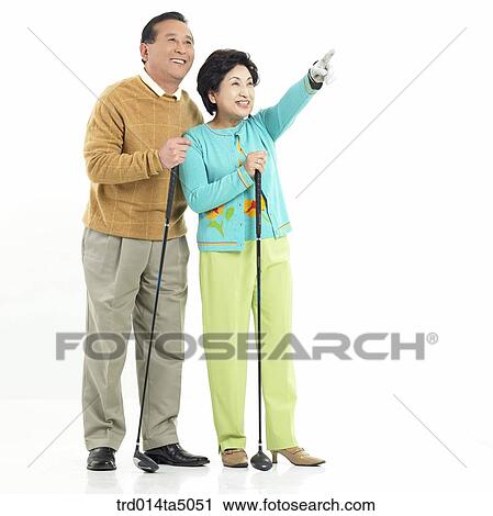 Family/ an old couple pointing at something View Large Photo Image Stock Image - Family/ an old couple pointing at something. Fotosearch
