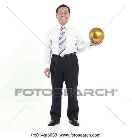The old/ A man holding a globe View Large Photo Image Stock Photo - The old/ A man holding a globe. Fotosearch