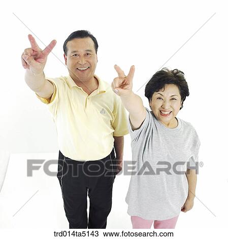 The old/ an old couple drawing V in the air View Large Photo Image Stock Image - The old/ an old couple drawing V in the air. Fotosearch