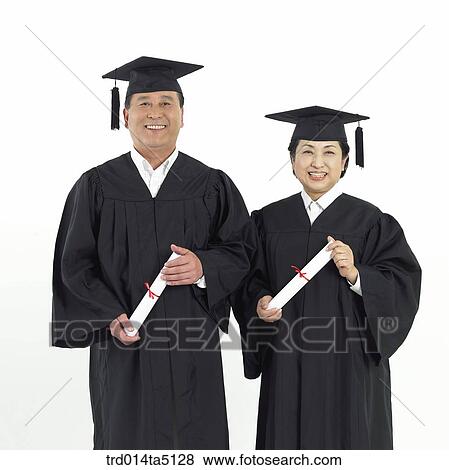 The old/ an old couple holding a diploma wearing a graduation hat View Large Photo Image Stock Photo - The old/ an old couple holding a diploma wearing a graduation hat. Fotosearch