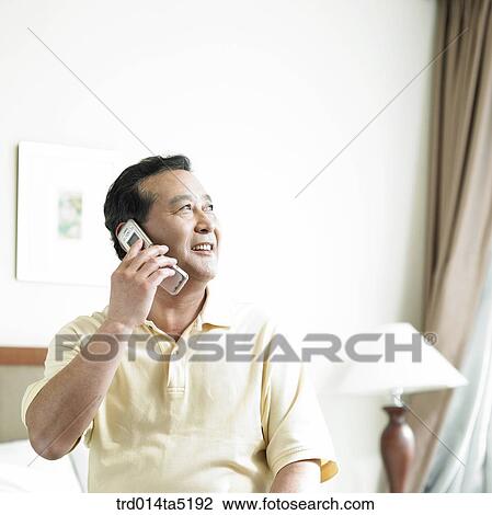 a calling old man on a bed View Large Photo Image Stock Image - a calling old man on a bed. Fotosearch