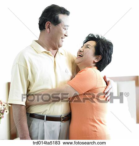 Stock Image - a smiling old couple. Fotosearch