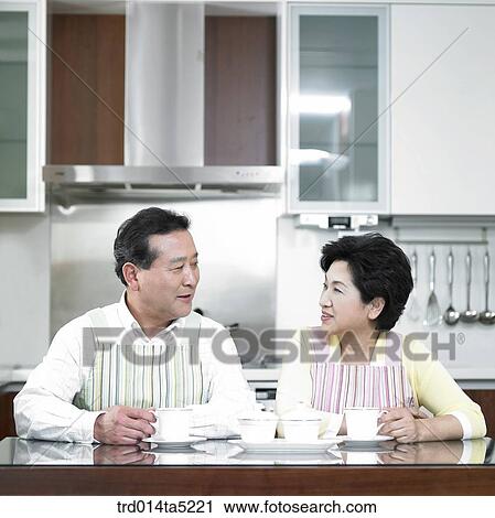an old couple drinking tea View Large Photo Image Stock Image - an old couple drinking tea. Fotosearch