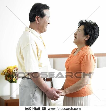 an old couple holding each other's hands View Large Photo Image Stock Photograph - an old couple holding each other's hands. Fotosearch