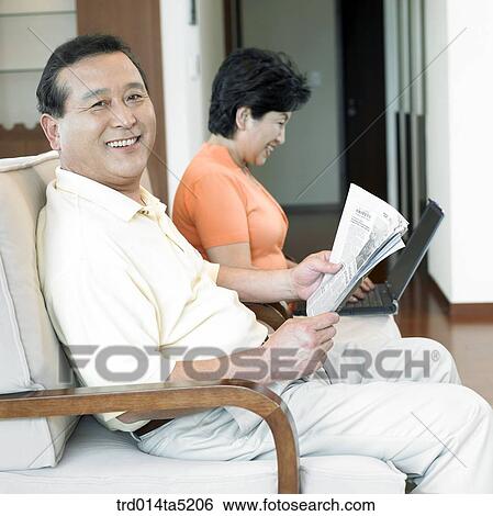 an old couple on a chair View Large Photo Image Stock Photograph - an old couple on a chair. Fotosearch