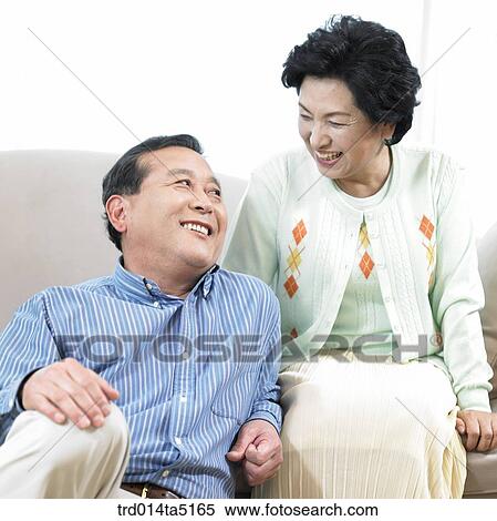 an old couple on a sofa View Large Photo Image Stock Photography - an old couple on a sofa. Fotosearch