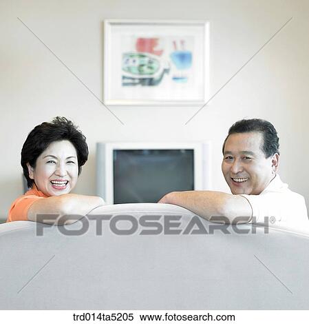 Stock Photography - an old couple on a sofa. Fotosearch