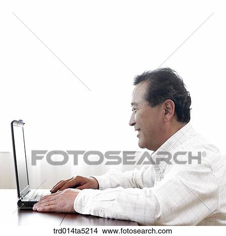 an old man using a notebook View Large Photo Image Picture - an old man using a notebook. Fotosearch