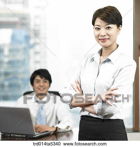 a businessman and a businesswoman View Large Photo Image Stock Image - a businessman and a businesswoman. Fotosearch