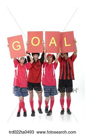 a cheering group of supporters holding a flag card high View Large Photo Image Stock Image - a cheering group of supporters holding a flag card high. Fotosearch