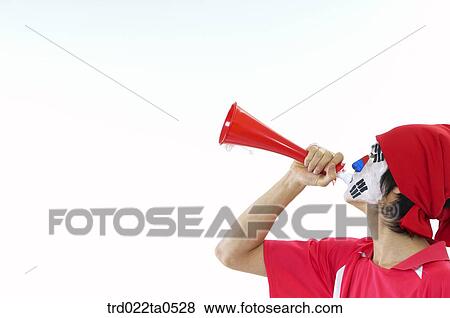 Stock Photo - a face-painting supporter. Fotosearch