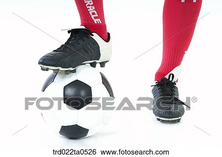 a foot on a ball View Large Photo Image Stock Photograph - a foot on a ball. Fotosearch