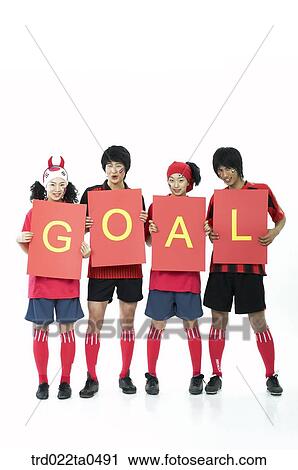 Stock Image - a group of supporters holding a flag card. Fotosearch