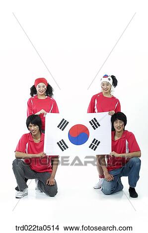 a group of supporters holding Taegeukgi View Large Photo Image Picture - a group of supporters holding Taegeukgi. Fotosearch