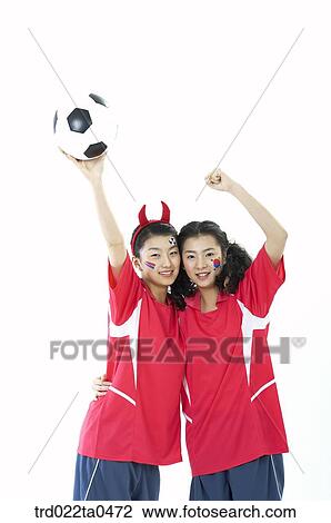 Stock Image - a supporter clenching his fist. Fotosearch