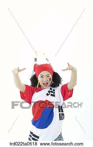 Stock Photo - a supporter putting around Taegeukgi. Fotosearch