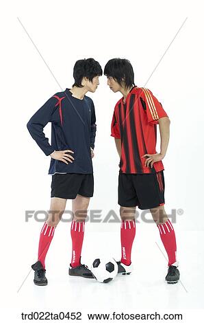 two players between a ball View Large Photo Image Stock Image - two players between a ball. Fotosearch