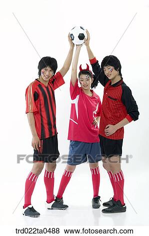 Stock Photo - two supporters and Taegeukgi. Fotosearch