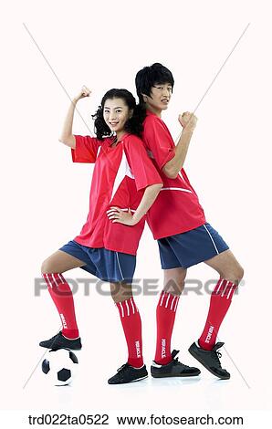 two supporters leaning each other back View Large Photo Image Stock Image - two supporters leaning each other back . Fotosearch