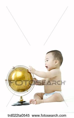 a baby in front of a globe View Large Photo Image Stock Photography - a baby in front of a globe. Fotosearch