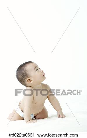 a baby looking upwards View Large Photo Image Stock Image - a baby looking upwards. Fotosearch