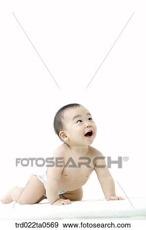 a baby looking upwards View Large Photo Image Stock Photo - a baby looking upwards. Fotosearch