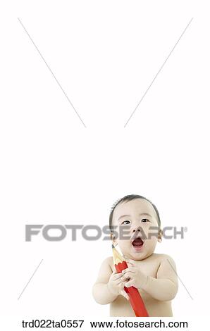 a baby playing a toy View Large Photo Image Stock Photo - a baby playing a toy. Fotosearch