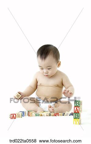 a baby playing blocks View Large Photo Image Stock Photo - a baby playing blocks. Fotosearch