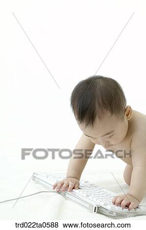 a baby using a keyboard View Large Photo Image Stock Photo - a baby using a keyboard. Fotosearch