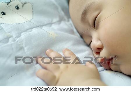 a baby's face and hands View Large Photo Image Stock Image - a baby's face and hands. Fotosearch