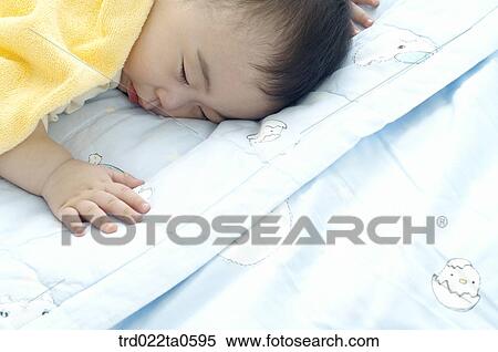 a sleeping baby View Large Photo Image Stock Photography - a sleeping baby. Fotosearch