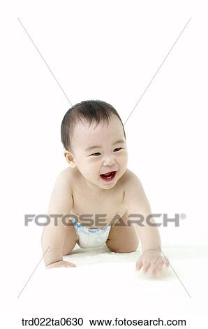 Stock Image - a toddling baby. Fotosearch