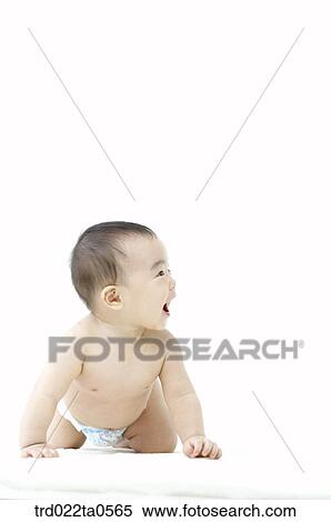 Stock Photography - a toddling baby. Fotosearch