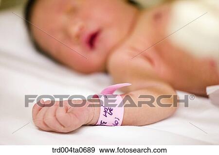 a lying newborn baby View Large Photo Image Stock Photo - a lying newborn baby. Fotosearch