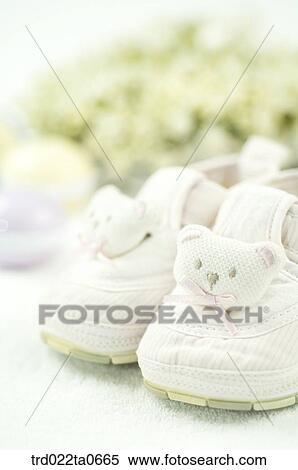 baby supplies/a babyshoe View Large Photo Image Stock Photography - baby supplies/a babyshoe. Fotosearch