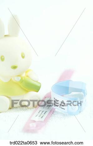 baby supplies/a band and a rabbit doll View Large Photo Image Stock Image - baby supplies/a band and a rabbit doll. Fotosearch