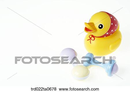 baby supplies/a noisemaker and a duck doll View Large Photo Image Stock Photo - baby supplies/a noisemaker and a duck doll. Fotosearch