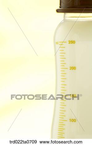 baby supplies/a nursing bottle and a scale View Large Photo Image Stock Photo - baby supplies/a nursing bottle and a scale. Fotosearch