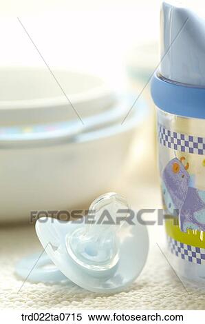 baby supplies/a vessel and a nursing bottle View Large Photo Image Stock Photography - baby supplies/a vessel and a nursing bottle. Fotosearch