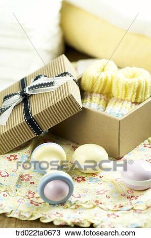 baby supplies/baby shoes and many things in a present box View Large Photo Image Stock Image - baby supplies/baby shoes and many things in a present box. Fotosearch
