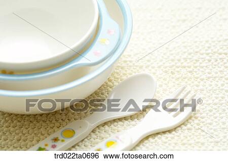 Stock Photograph - baby supplies/tableware, a fork, and a spoon. Fotosearch