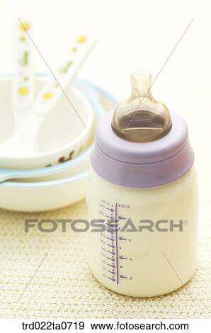 baby supplies/tableware and a baby nursing bottle View Large Photo Image Stock Photo - baby supplies/tableware and a baby nursing bottle. Fotosearch