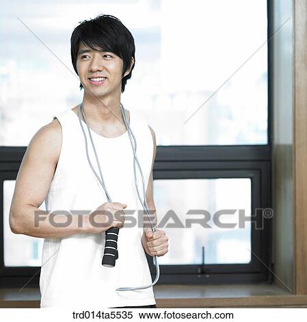 a man holding a rope View Large Photo Image Stock Photography - a man holding a rope. Fotosearch