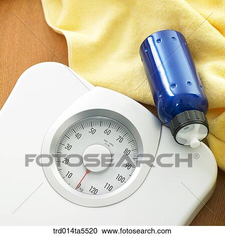 a scale and a water bottle View Large Photo Image Stock Image - a scale and a water bottle. Fotosearch