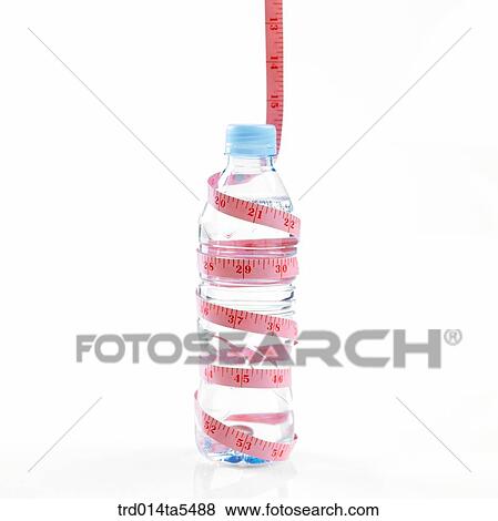 a water bottle and a ruler View Large Photo Image Stock Photo - a water bottle and a ruler. Fotosearch
