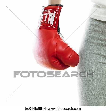 a woman wearing boxing gloves View Large Photo Image Picture - a woman wearing boxing gloves. Fotosearch