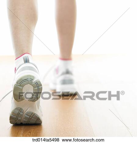 an exercising woman's leg View Large Photo Image Stock Photo - an exercising woman's leg. Fotosearch