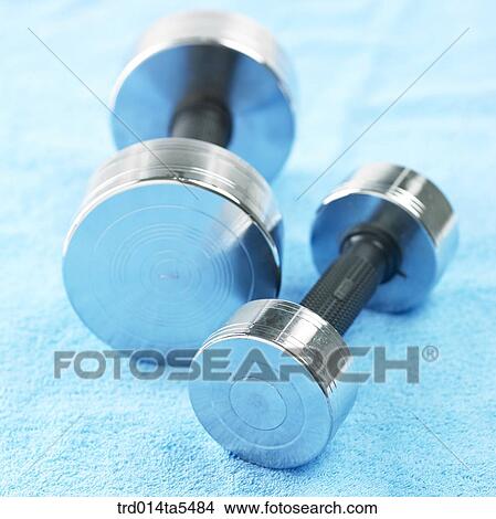 dumbbells and a towel View Large Photo Image Picture - dumbbells and a towel. Fotosearch